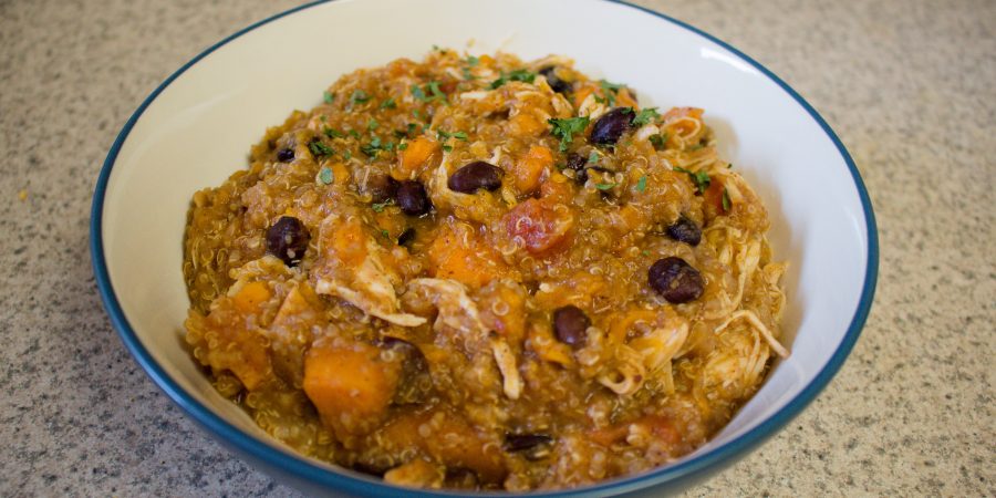 Need something easy, filling and delicious to make for dinner? Try this hearty quinoa fall stew! Full of sweet potatoes, tomatoes, chicken and black beans, it's the perfect balance of comforting and healthy! | Teaspoon of Nose