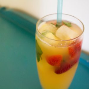 Pineapple strawberry punch makes the perfect mocktail for a summer afternoon!