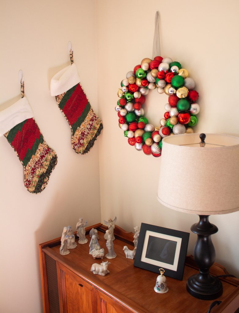 This DIY ornament wreath is a fantastic little DIY that you can put together in an hour for an elegant bit of Christmas decor!