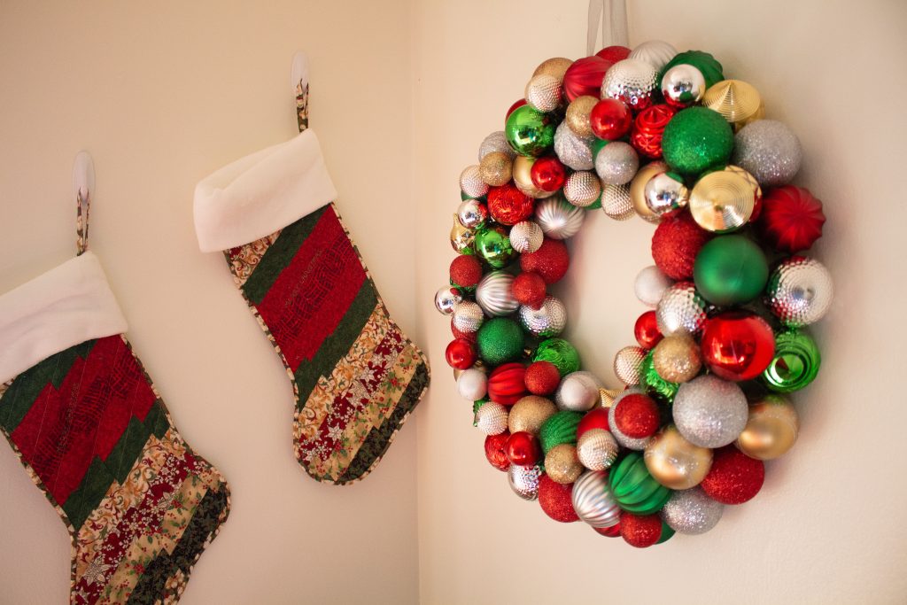 This DIY ornament wreath is a fantastic little DIY that you can put together in an hour for an elegant bit of Christmas decor!