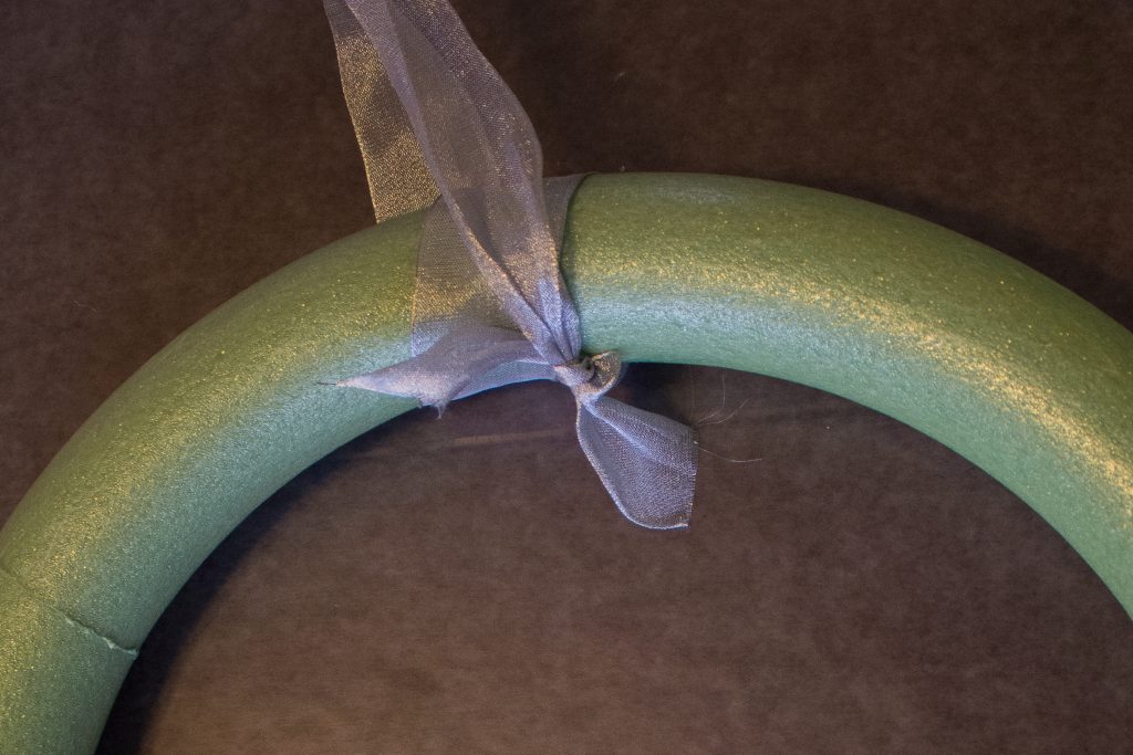 This DIY ornament wreath is a fantastic little DIY that you can put together in an hour for an elegant bit of Christmas decor!