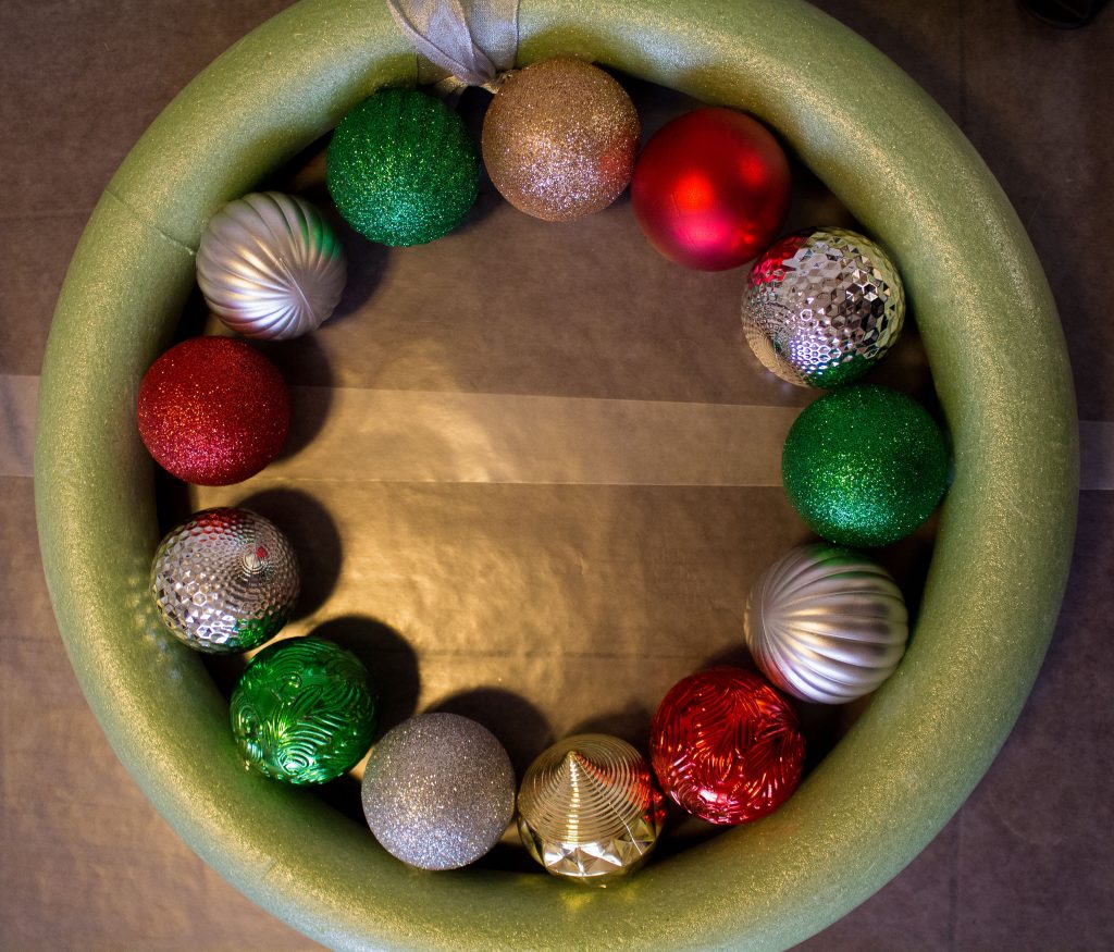 This DIY ornament wreath is a fantastic little DIY that you can put together in an hour for an elegant bit of Christmas decor!