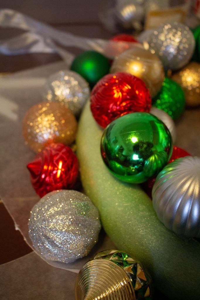 This DIY ornament wreath is a fantastic little DIY that you can put together in an hour for an elegant bit of Christmas decor!