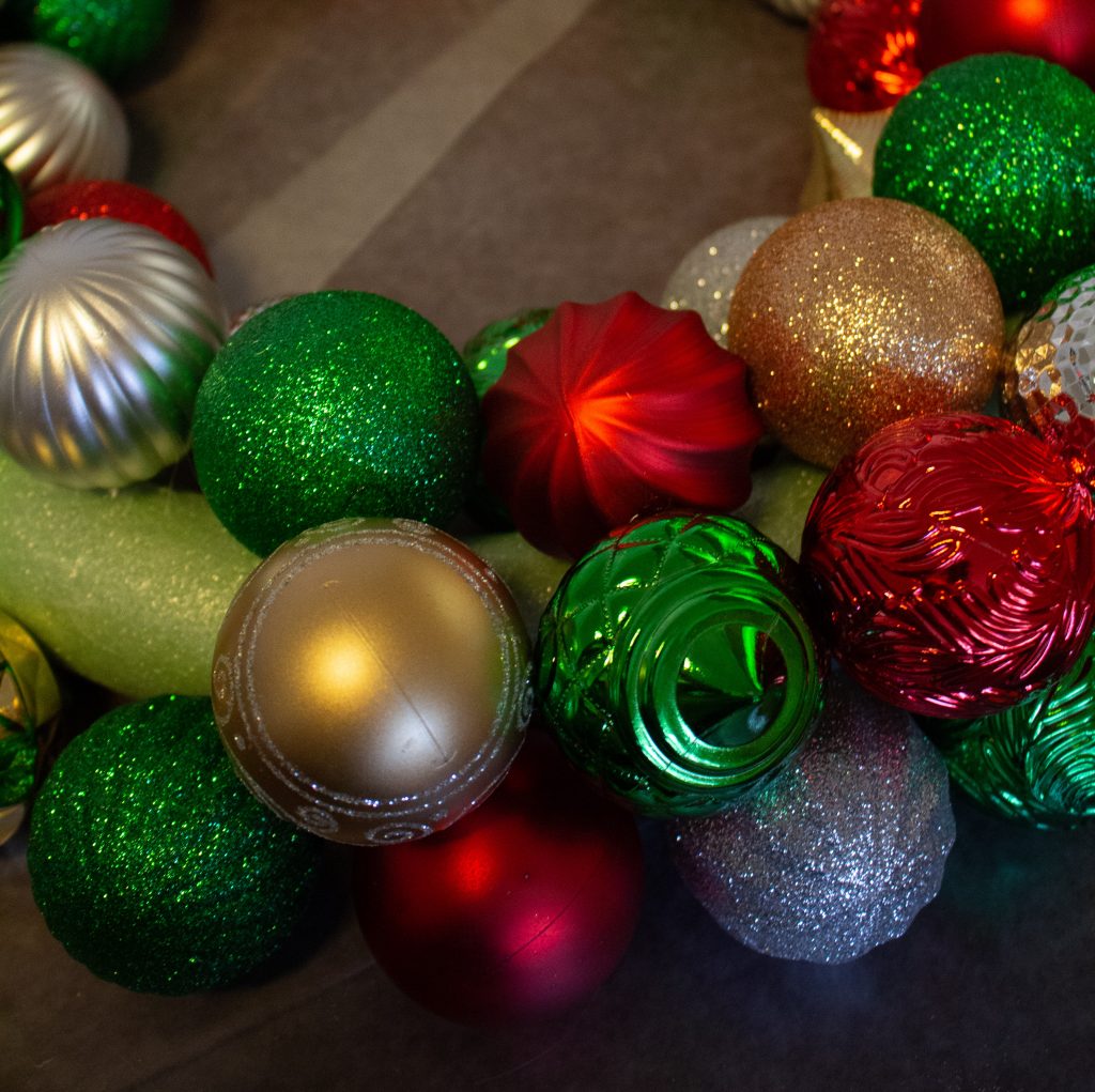 This DIY ornament wreath is a fantastic little DIY that you can put together in an hour for an elegant bit of Christmas decor!