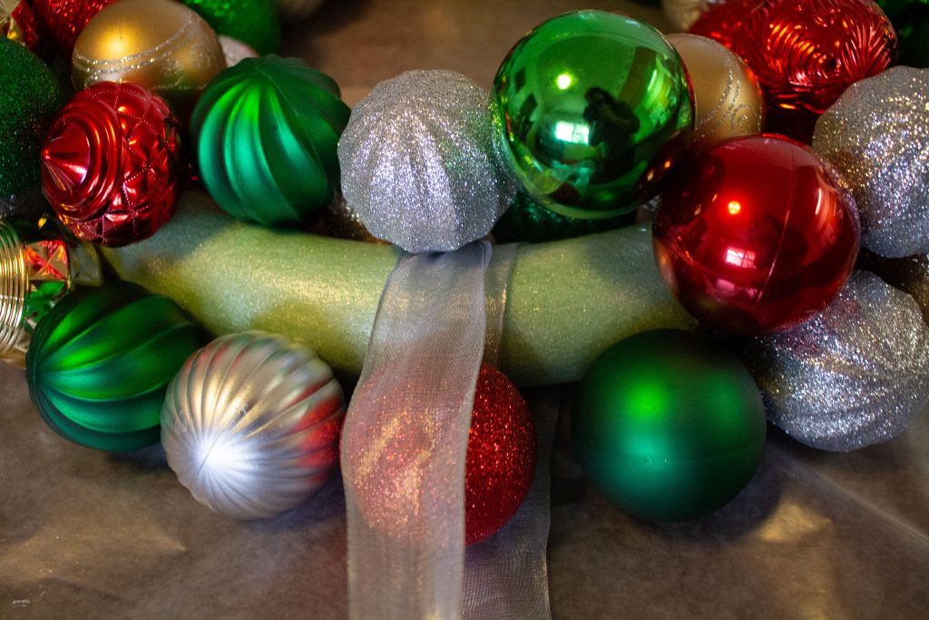 This DIY ornament wreath is a fantastic little DIY that you can put together in an hour for an elegant bit of Christmas decor!