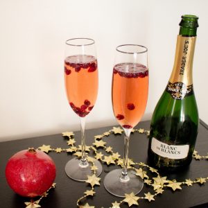This pomegranate champagne cocktail makes the perfect drink for New Year's Eve! Festive and bubbly, they have the perfect mix of sweet and tart for ringing in the new year.