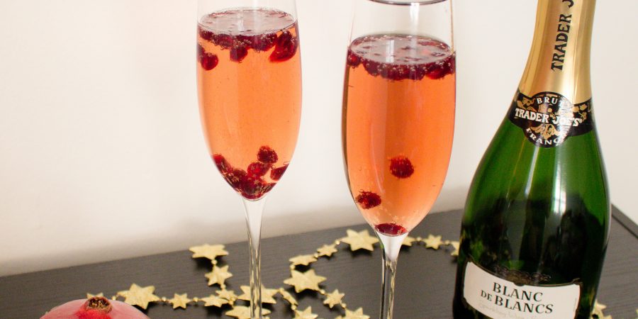 This pomegranate champagne cocktail makes the perfect drink for New Year's Eve! Festive and bubbly, they have the perfect mix of sweet and tart for ringing in the new year.