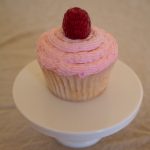 Raspberry Champagne cupcakes are light and fluffy, with champagne in both cupcakes and frosting and a zing of fresh raspberries to top it off! Bet you can't eat just one...