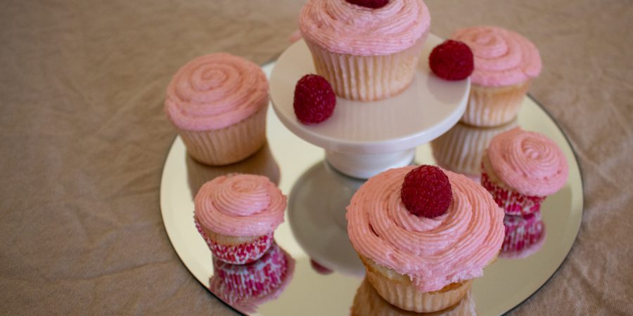 Raspberry Champagne cupcakes are light and fluffy, with champagne in both cupcakes and frosting and a zing of fresh raspberries to top it off! Bet you can't eat just one...