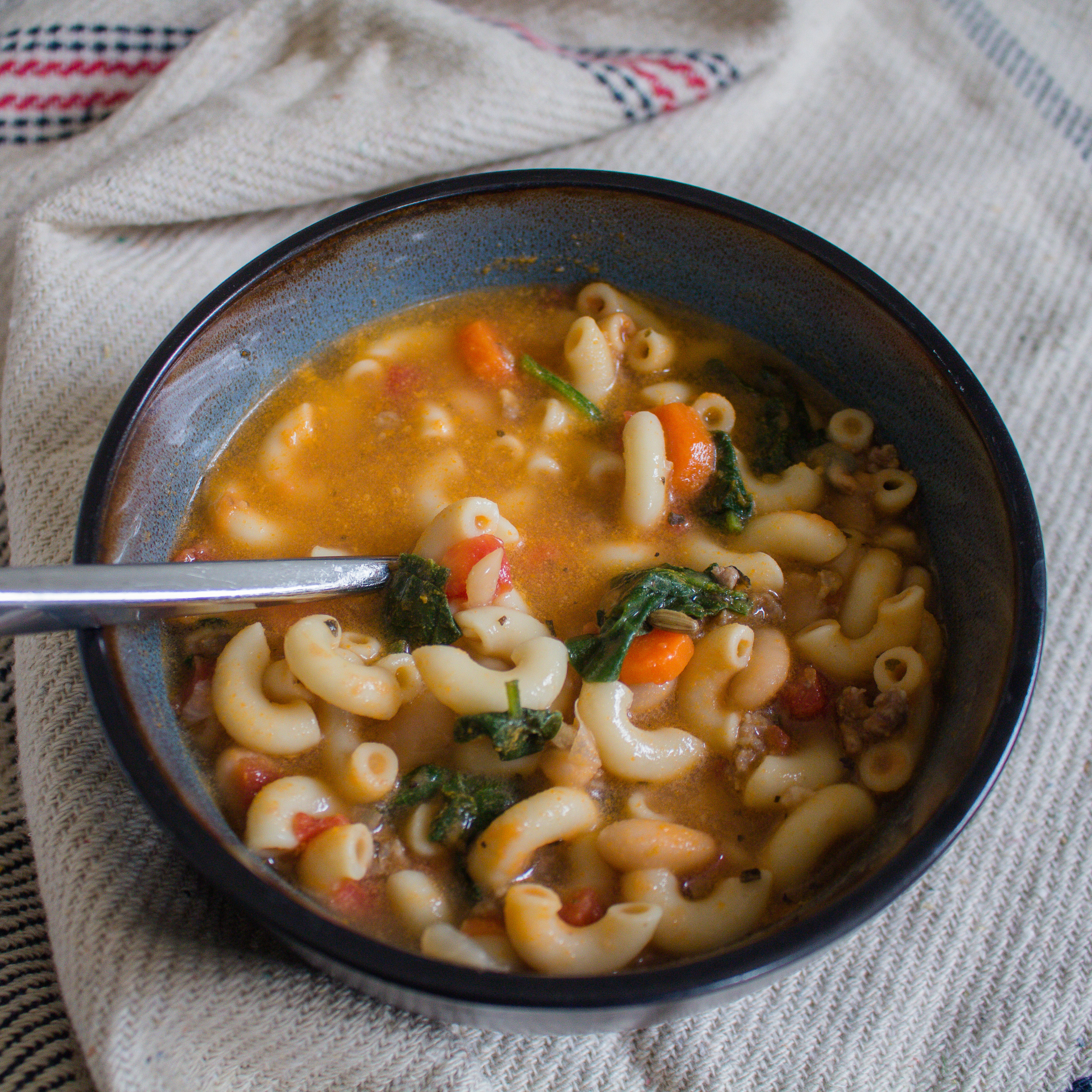 Tuscan Sausage Soup is hearty, delicious, and will feed an army!!
