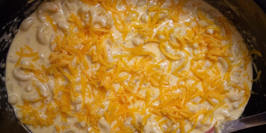 Slow cooker macaroni and cheese is the best thing you can bring to a party or potluck!