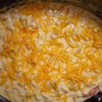 Slow cooker macaroni and cheese is the best thing you can bring to a party or potluck!