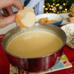 Cheese fondue is the perfect addition to your New Year's Eve party! It makes any gathering feel like a party, and this classic version is effortless to whip up!