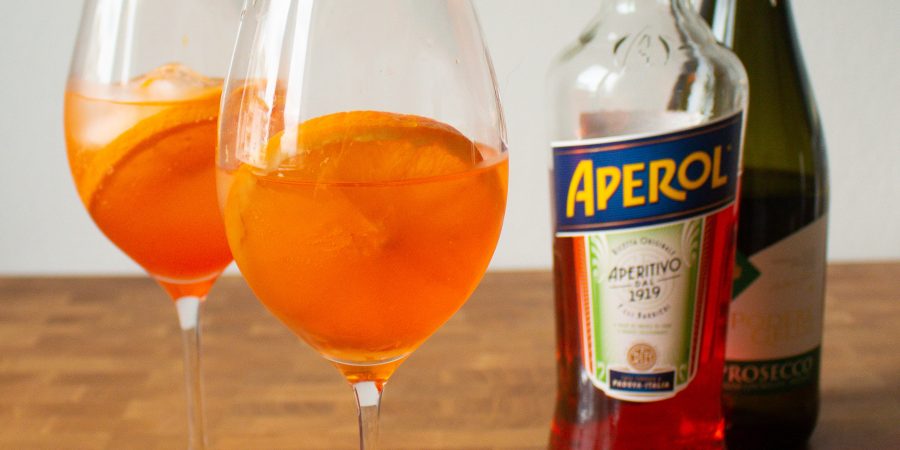 Aperol Spritz is a classic Italian apertivo, and they're so easy to make at home! I'm sharing the two different classic versions, and my own favorite aperol spritz recipe! | Teaspoon of Nose