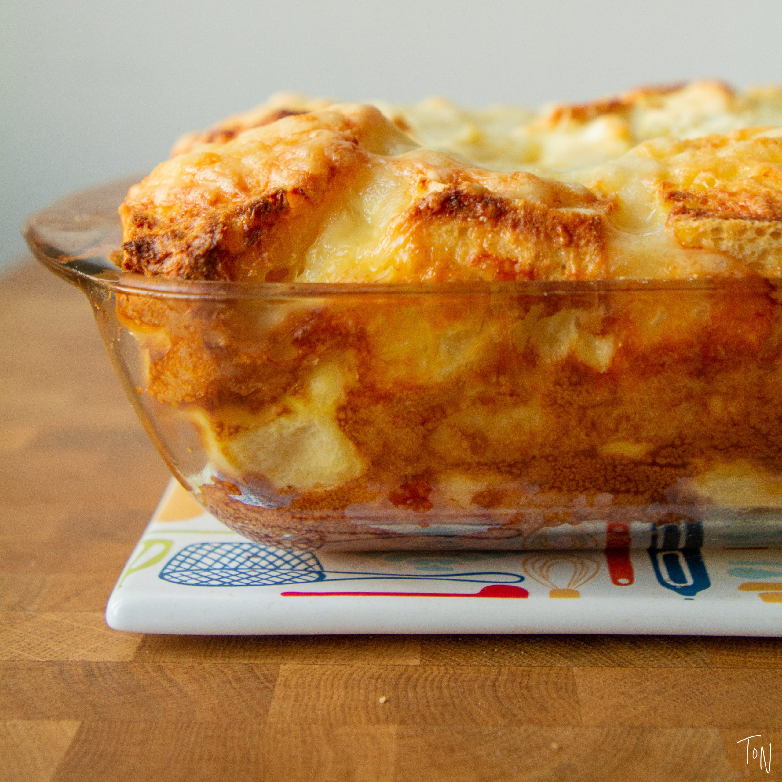 Classic strada covers your savory breakfast essentials: bread, cheese, and eggs!