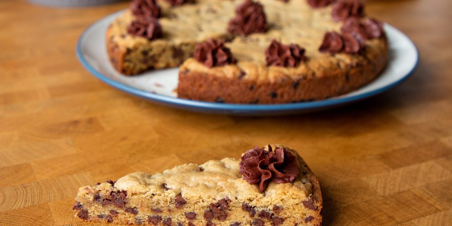 Making a classic chocolate chip cookie cake at home is crazy easy! Here's what you need to know to make your own.
