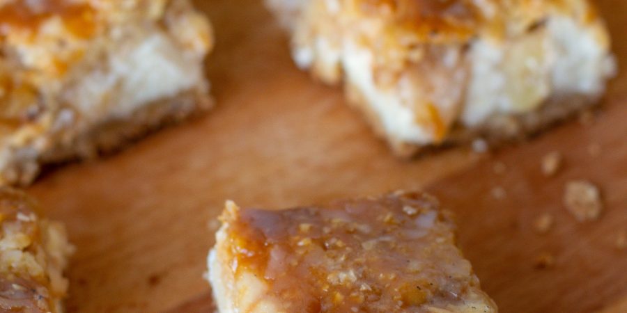 Caramel apple cheesecake bars give the best of the cravable comfort of apple pie and rich, gooey cheesecake!