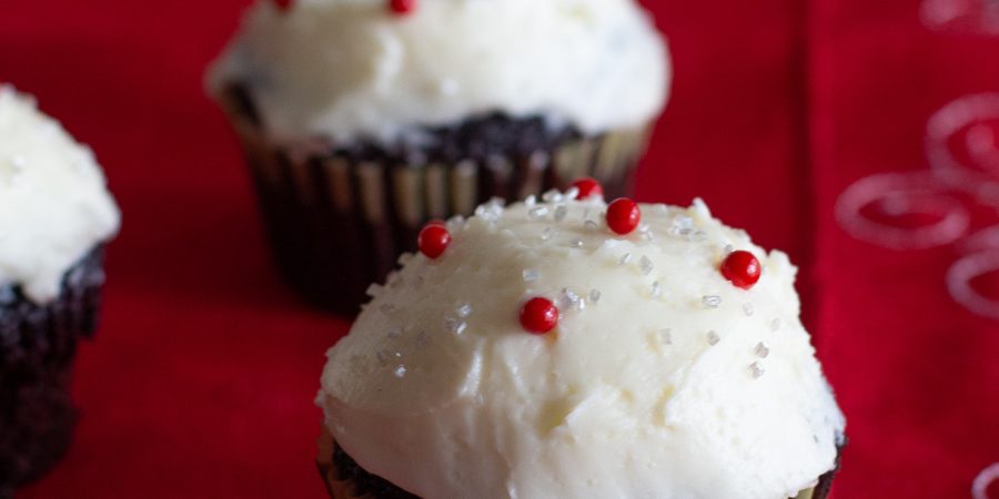 Packed with deep chocolate flavor and topped peppermint swiss meringue buttercream, dark chocolate peppermint cupcakes are the Christmas dessert you didn't know you needed!!