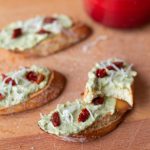 These creamy pesto and tomato crostini will give you the brightness of summer even in the middle of winter!