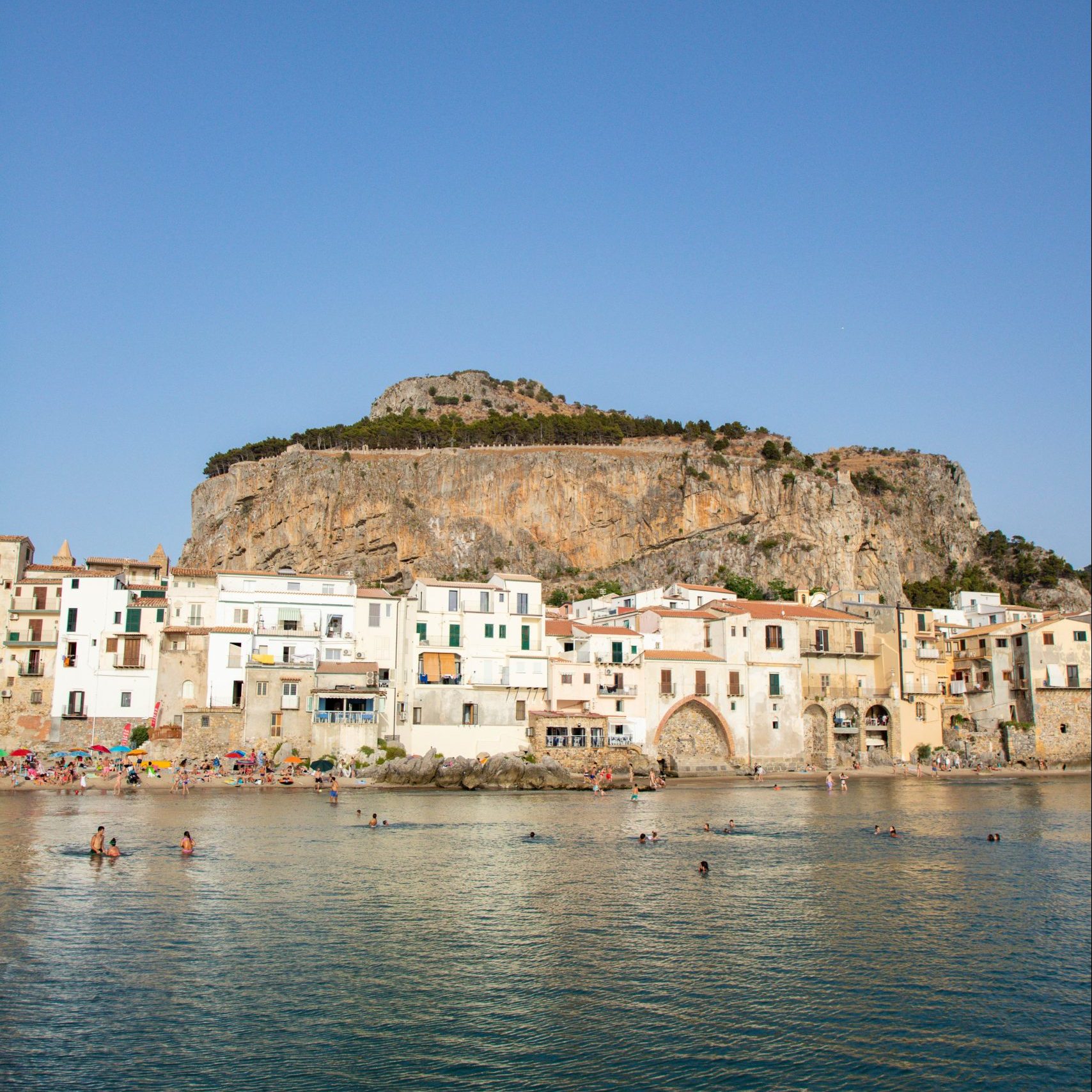 Italians love Cefalu as a vacation destination - for good reason! Here's what you should know to plan your trip!