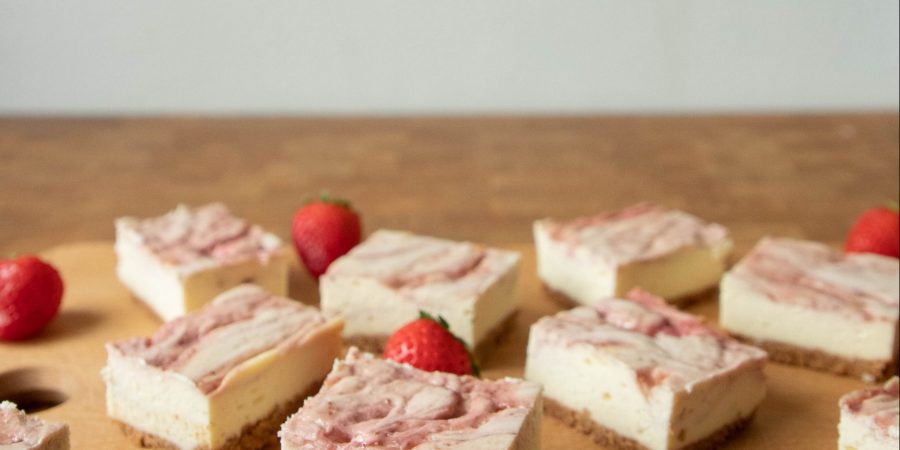 These strawberry cheesecake bars with the hit of your next party or potluck!