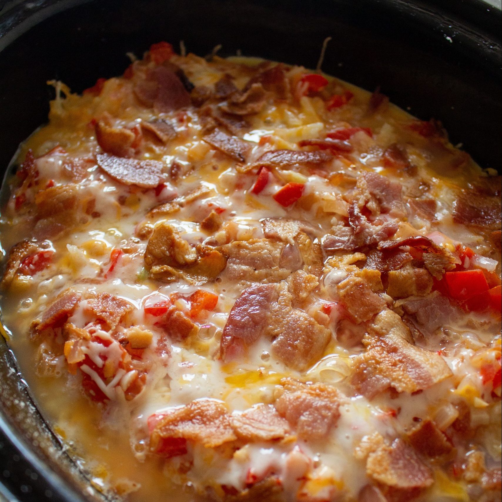 Looking for a fantastic breakfast crockpot to feed a crowd? This egg hashbrown dish is your winner! 